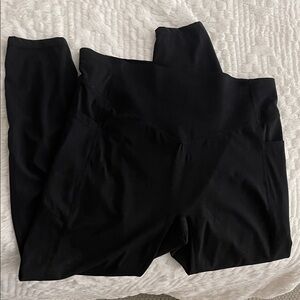 Black XL Halara high waisted scrunch butt lifting 7/8 tummy control pockets